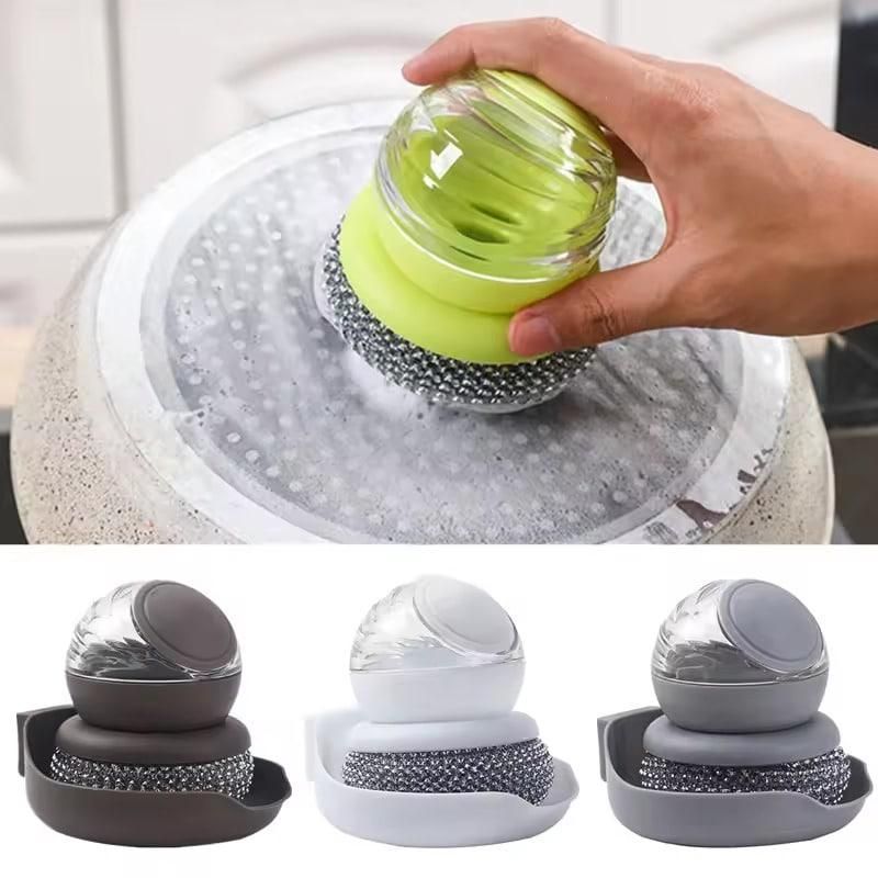 Hand holding a modern automatic soap dispenser scrubbing a surface with three color options displayed below