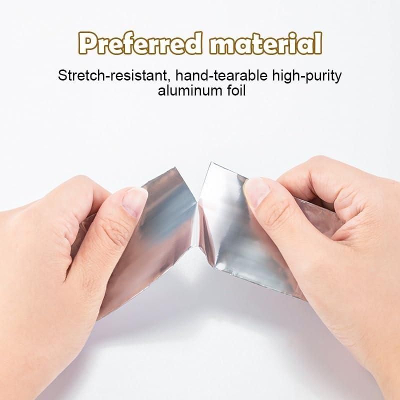 Hands tearing stretch-resistant aluminum foil demonstrating fireproof adhesive tape for kitchen durability